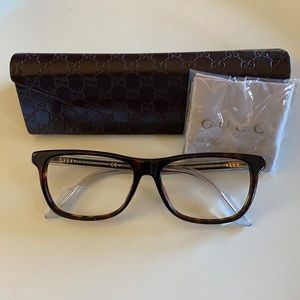 Gently used Gucci ophthalmic frame in tortoise.